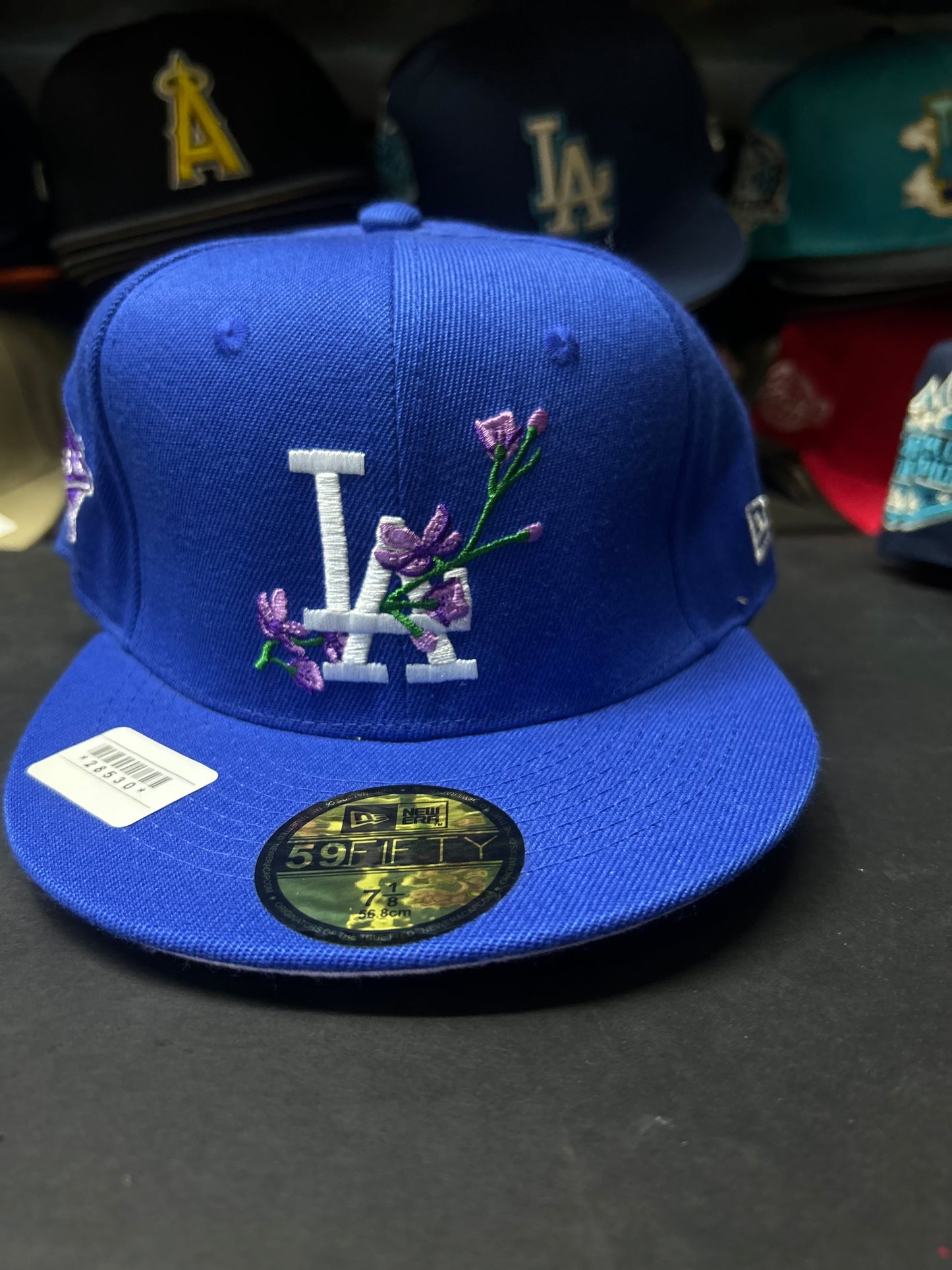 GORRA 59FIFTY MODELO LOS ÁNGELES  FLORES MORADAS